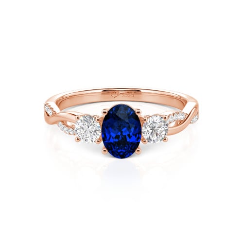Jeulia Twist Three Stone Oval Cut Sterling Silver Ring