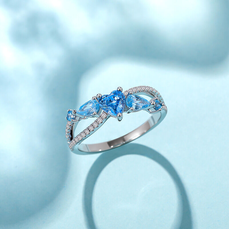 Jeulia Twist Multi Stone Aquamarine Infinity Promise Ring