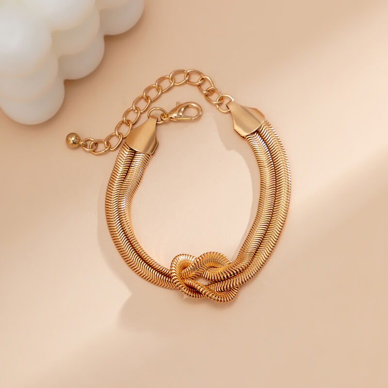 Jeulia Knot Design Gold Tone Chain Bracelet