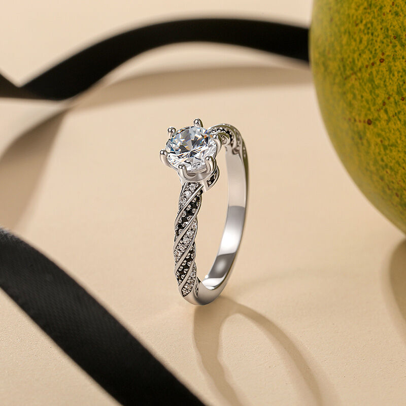 Jeulia Twisted Black and White Round Solitaire Engagement Ring