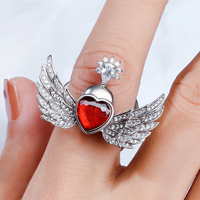 Jeulia Anillo movible con corazón y alas de ángel de piedras de plata de ley