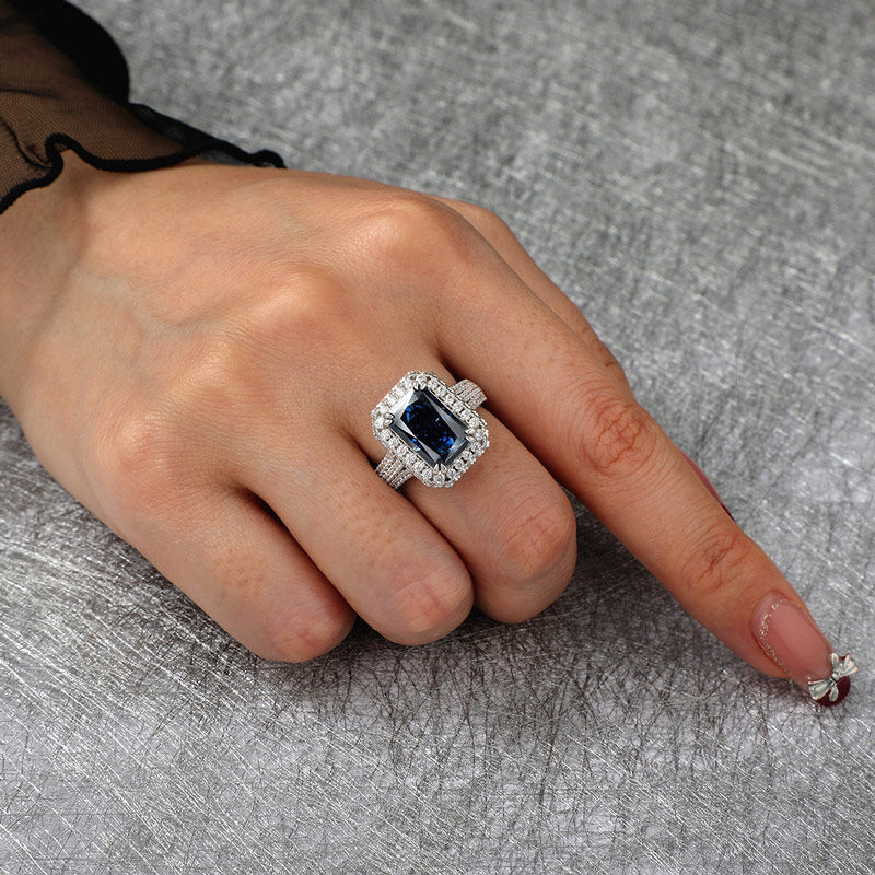 Jeulia "Captivating Brilliance" Emerald Cut Halo Sterling Silver Ring