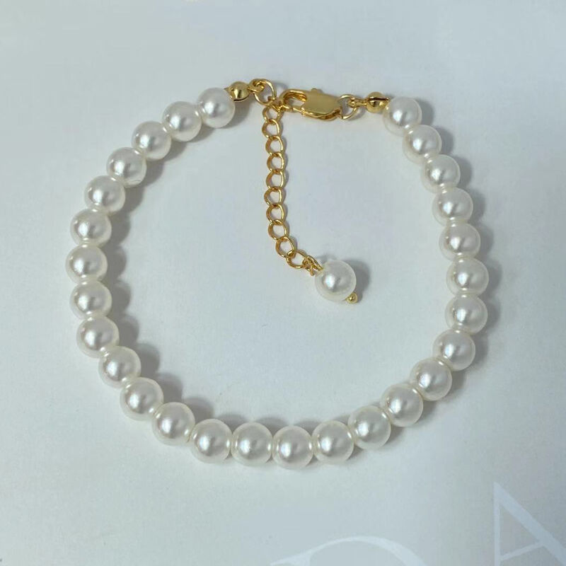 Jeulia "Timeless Elegance" Classic Golden Tone Pearl Bracelet