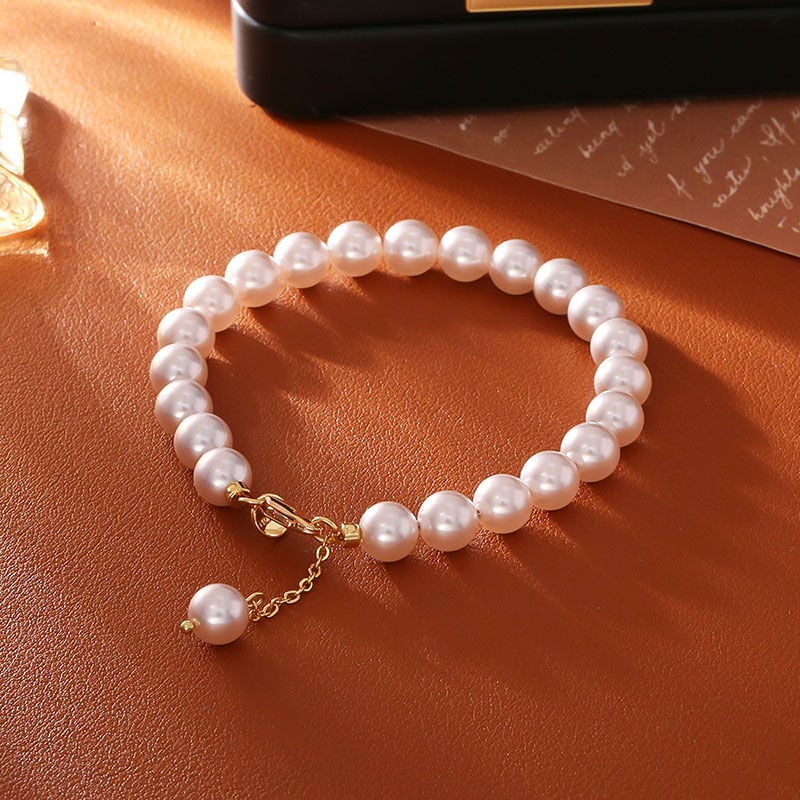 Jeulia "Timeless Elegance" Classic Golden Tone Pearl Bracelet