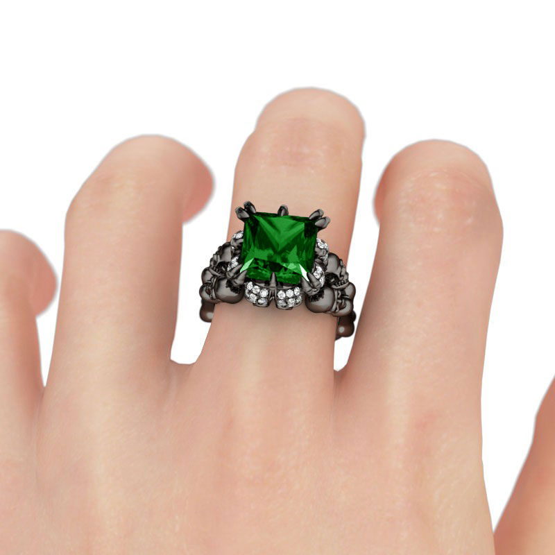 Jeulia Black Tone Princess Cut Created Emerald Four Skull Ring