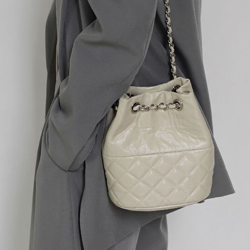 Jeulia Bolsa bucket acolchoada mini bolsa de ombro moda casual de couro elegante