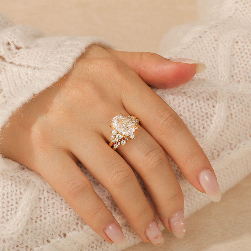 Jeulia Conjunto de Anillos de Novia con Corte Ovalado Oro con Piedra Lateral de Plata de Ley