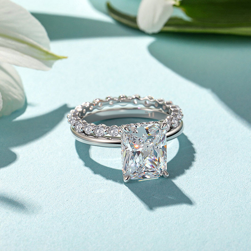 Jeulia Juego de Anillos de Compromiso Corte Princesa con Halo Oculto