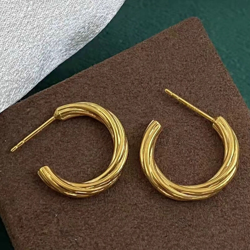 Jeulia Gold Tone Twisted Rope Sterling Silver Hoop Earrings