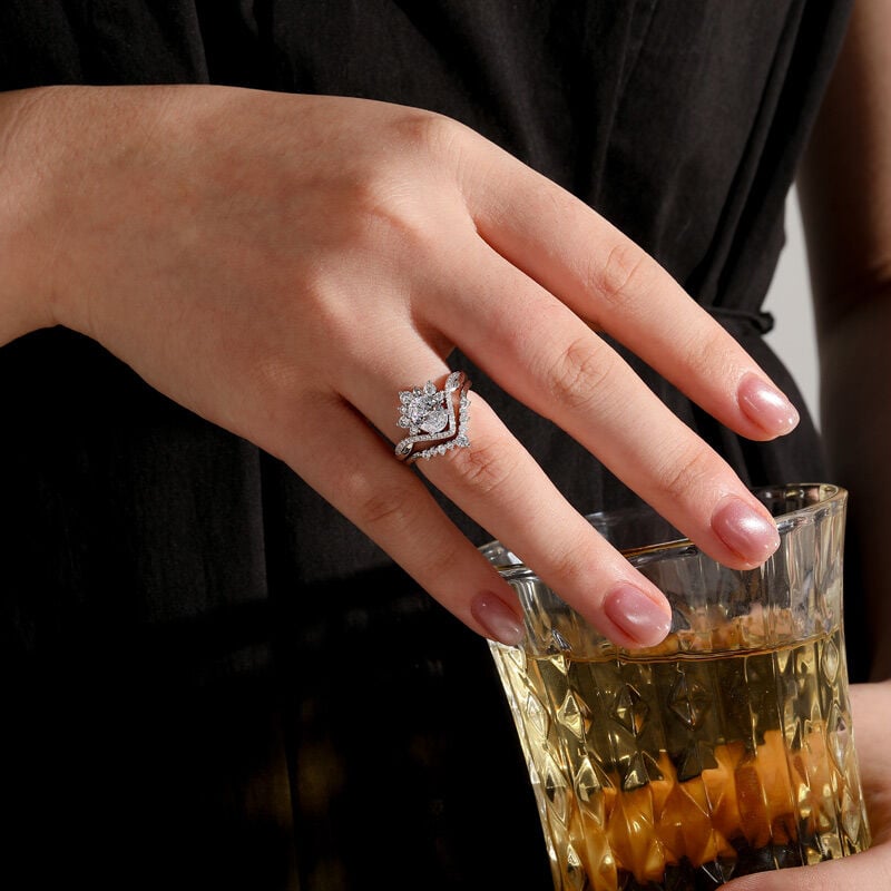 Jeulia Twisted Oval Halo Bridal Ring Set with Cluster Enhancer